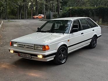 prado 2017: Nissan Sunny: 1989 г., 1.7 л, Механика, Дизель — 1