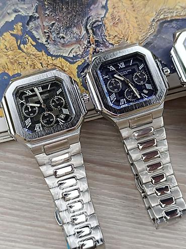 willande saat: Məhsul: Kvars xronoqraflı kişi qol saatı (metal biləkbağı ilə) Rolex — 1
