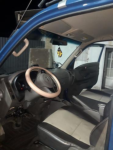 Коммерческий транспорт: Hyundai Porter II, бортовой грузовик в синем цвете. Компактный — 5