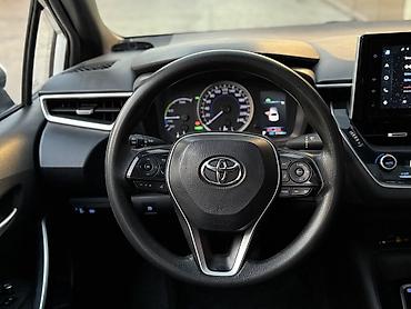 дишевли машина: Toyota Corolla: 2020 г., 1.8 л, Вариатор, Гибрид, Седан — 10