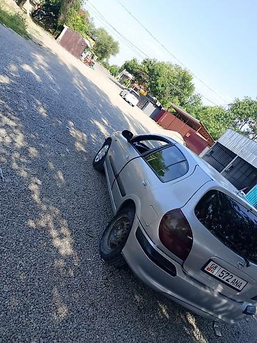 мереке авто: Nissan Almera: 2001 г., Кол менен иштөөчү, Бензин, Хетчбек — 4