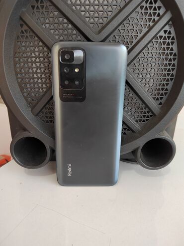 Мобильные телефоны и аксессуары: Xiaomi Redmi 10, 128 ГБ, цвет - Черный, 
 Кнопочный, Отпечаток пальца, Face ID