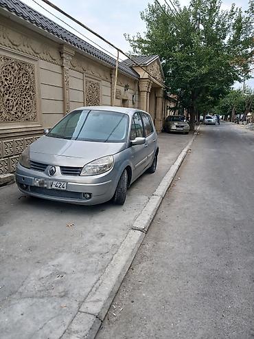 panel vurmaq: Renault Scenic, gümüşü rəng, 5 qapı, kompakt minivan. tək problem — 1