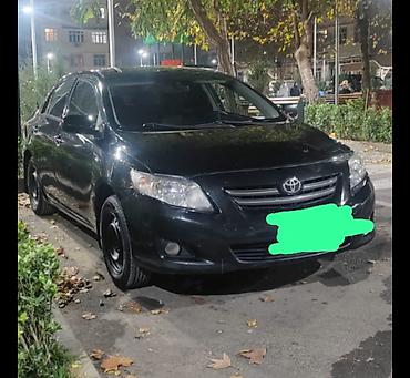 corolla cros: Toyota Corolla sedan – qara rəng, şəhər və tras üçün ideal kompakt — 1