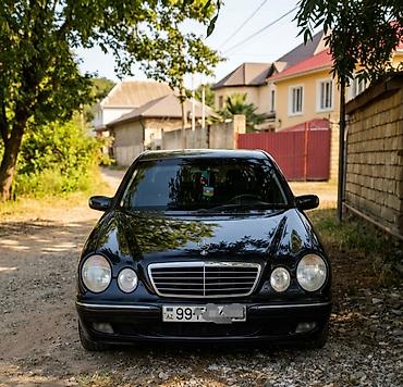 Mercedes-Benz: Mercedes‑Benz E‑Class (W210) sedan - Korpus: qara rəng, 4 qapı, xrom — 4
