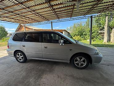 одиссей 2 4: Honda Odyssey: 2002 г., 2.3 л, Автомат — 3