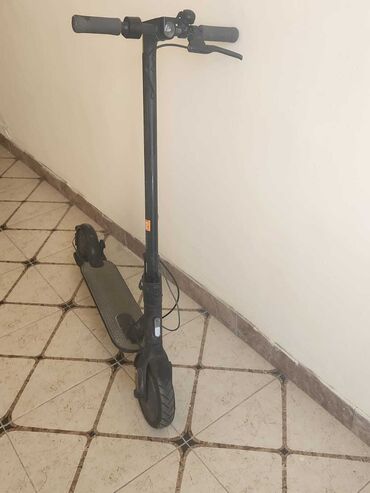elektrikli scooterler: Xiaomi model Elektrikli skuterdi problemsiz işleyir sadece adapteri