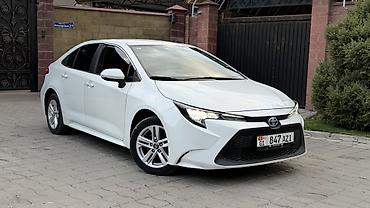 камри 75 2022: Toyota Corolla: 2020 г., 1.8 л, Вариатор, Гибрид, Седан — 2