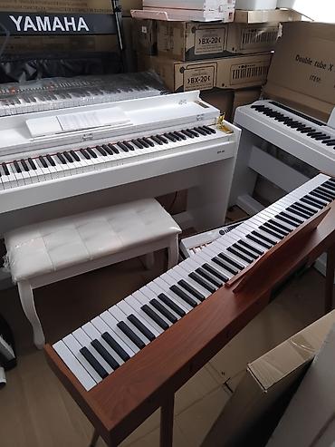 Uşaq dünyası: Elektro Pianino Qəhvəyi rəngli 88 klaviş tam oktava Pianino səslidir 4 — 4