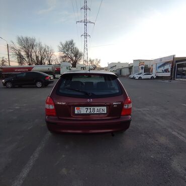 Mazda: Mazda Familia: 1998 г., 1.5 л, Механика, Бензин, Хэтчбэк — 4