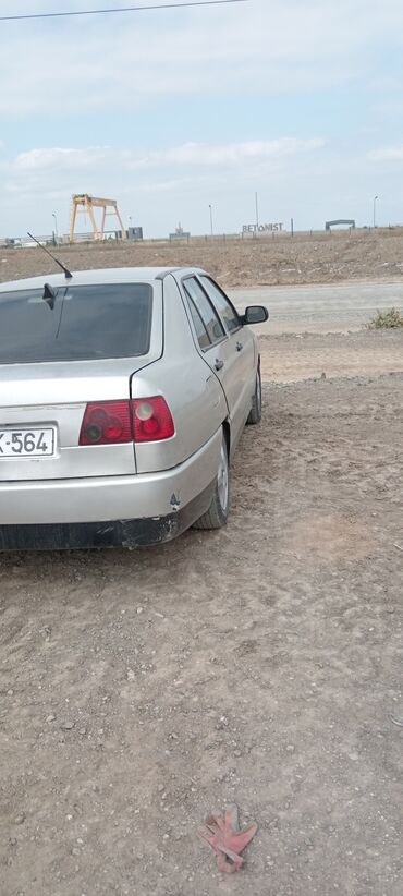 Chery: Model: Chery Amulet (A15) Kuzov: sedan, gümüşü rəng Sükan: solda — 2