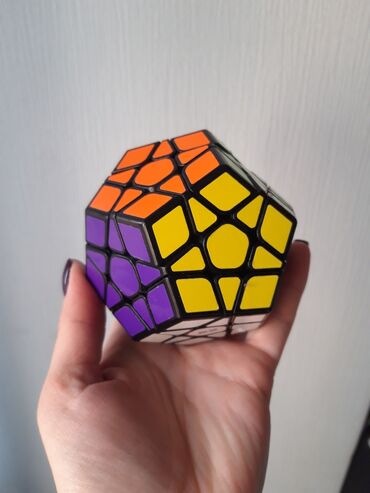 головоломка: Головоломка Скьюб 12 граней ( разновидность кубика Рубика).Почти
