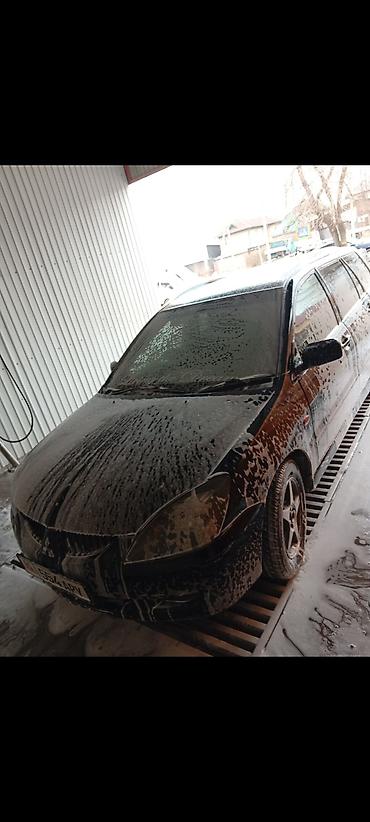 Mitsubishi: Mitsubishi Lancer: 2001 г., 1.8 л, Автомат, Бензин, Универсал — 21