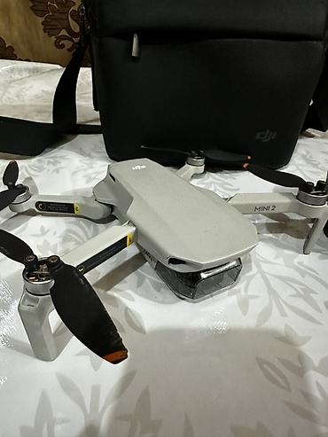 e88 drone: DJI Mini 2 — ультракомпактный дрон с камерой 4K и пультом — 2
