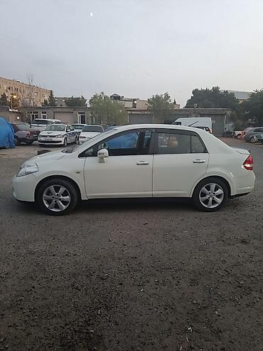 Nissan: Nissan Tiida: 1.6 l | 2008 il Sedan — 4