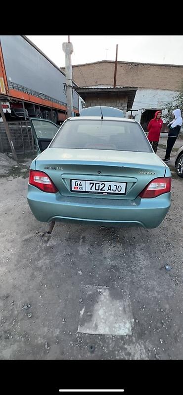 Daewoo Nexia: 2009 г., 1.6 л, Механика, Бензин, Седан