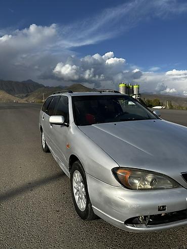 степ эреф 1: Nissan Almera Tino: 2002 г., 2 л, Кол менен иштөөчү, Бензин, Универсал — 1