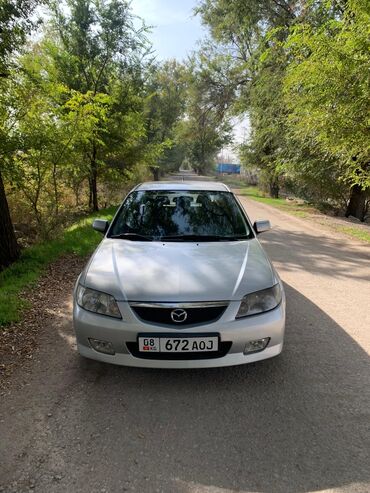 passat машина: Mazda 323: 2002 г., 1.6 л, Механика, Бензин