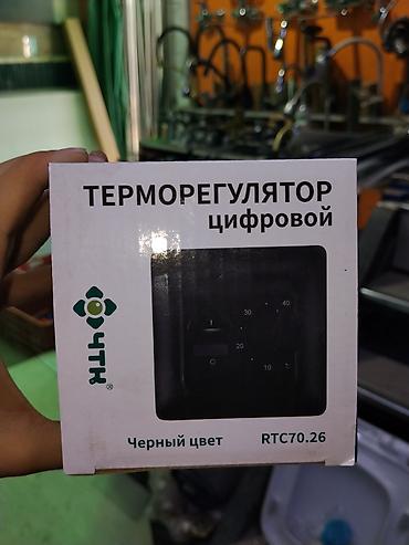 тепло: Цифровой терморегулятор RTC70.26 (черный цвет) Описание: - Настенный — 1