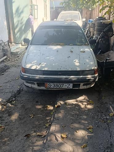 265 40 22: Mitsubishi Lancer: 1989 г., Механика, Седан — 3