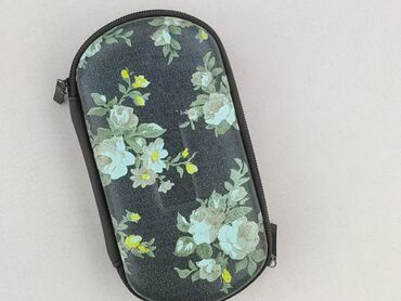 Etui na okulary o podłużnym, owalnym kształcie, zapinane na zamek