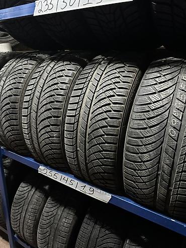 Зимние шины 255/45 R19 - Размер: 255/45 R19 (подпись на стеллаже). -