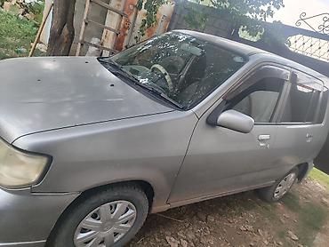 анотомический руль: Nissan Cube: 2002 г., 1.3 л, Автомат, Бензин, Хэтчбэк — 4