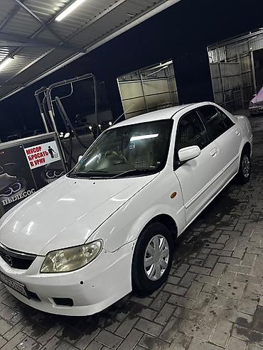 Mazda Familia: 2002 г., Бензин, Седан