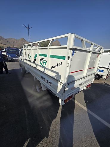 пикапы легковые: Hyundai Porter (Porter II) — малотоннажный бортовой грузовик с — 4