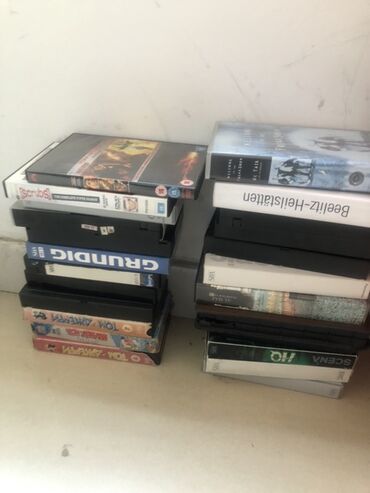 dvd disk qiymeti: Müxtəlif filmlər və proqramlar daxil olmaqla DVD və VHS formatlarında