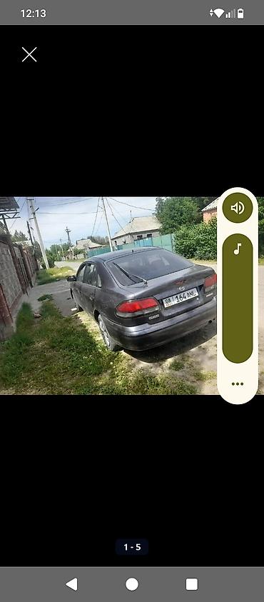 124 2 2: Mazda 626: 1999 г., Механика, Седан — 6