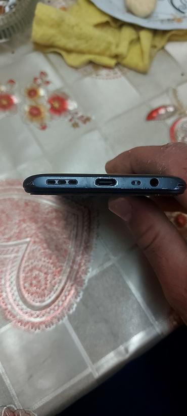 Redmi: Redmi 9, 64 GB, rəng - Qara, Barmaq izi — 3