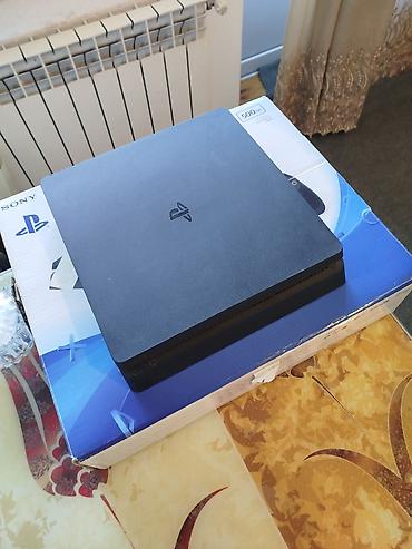 ps4 slim 2 tb: Sony PlayStation 4 Slim oyun konsolu Xüsusiyyətlər: - Rəng: qara - — 2