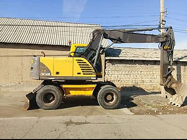 Экскаватор, Volvo, 2004 г., Колесный — 2