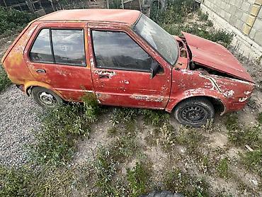 кызыл кия кыз: Nissan Март: 1992 г., Хетчбек — 4