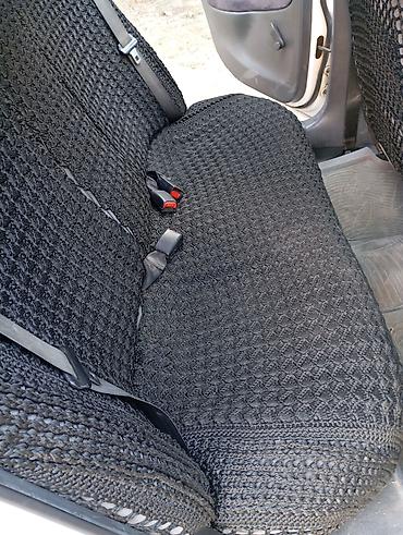 Daewoo: Daewoo Nubira sedan - Kuzov: 4 qapılı sedan, ağ rəng - Ban dizaynı — 9