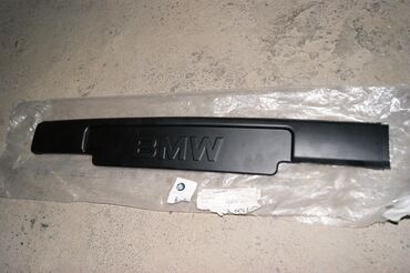 тюнинг бампера: Передняя накладка для квадратного гос. номера BMW E34, оригинал bmw