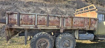 Yük maşınları üçün qoşqular: Bortları açılan kuza. Uzunluğu 4,3 m Eni 2,5 m Tam dəmir kuza — 12