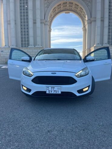 hybrid avtomobillər qiymətləri: Ford Focus: 0.1 л | 2017 г. 132129 км Седан