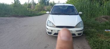 машина с российскими номерами: Ford Focus: 2004 г., 1.6 л, Механика, Бензин, Хетчбек