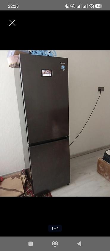 Midea soyuducu super vəziyyətdədir cox az istifadə olunub təcili