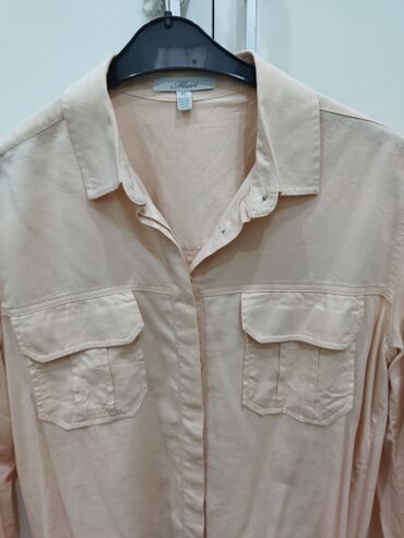 Koftalar, sviterlər: İsti triko sviterlər çox az geyinilib, her biri 7 azn — 14