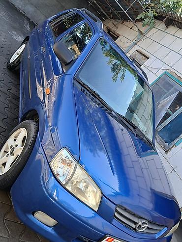 туманик одиссей: Mazda Demio: 2000 г., 1.5 л, Механика, Бензин, Хэтчбэк — 7