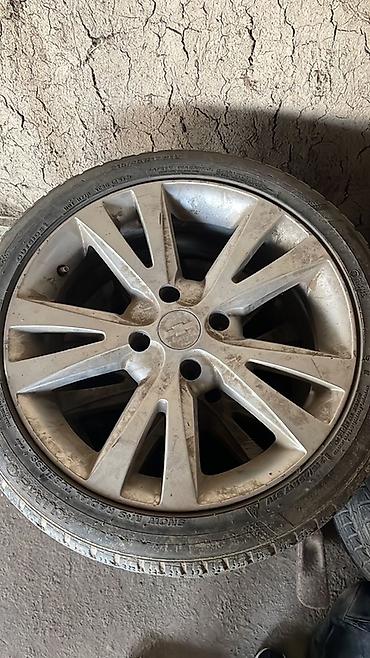 w210 55: Литой автомобильный диск с шиной. Характеристики по фото: - Диск — 1
