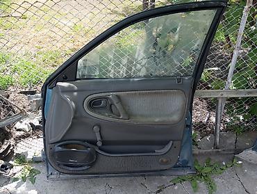 Автозапчасти: Продам двери на Мазда Кронос хэтчбек 1992 года в наличии 1 дверь — 1
