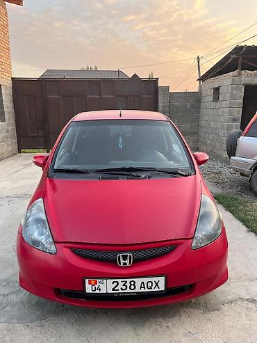 красный материал: Honda Jazz: 2006 г., 1.5 л, Автомат, Бензин, Хэтчбэк — 1