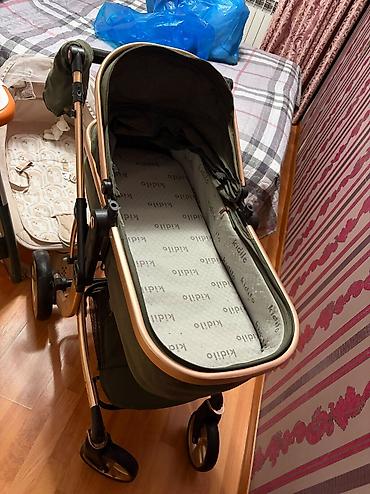 mini araba: Kidilo markalı uşaq arabası satılır. Zərif yaşıl rəngdə, qızılı tonlu — 4