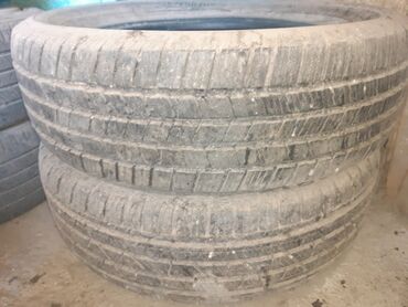 шины размер 20: Автомобильная шина с маркировкой 245/60R20 107H. Подходит для