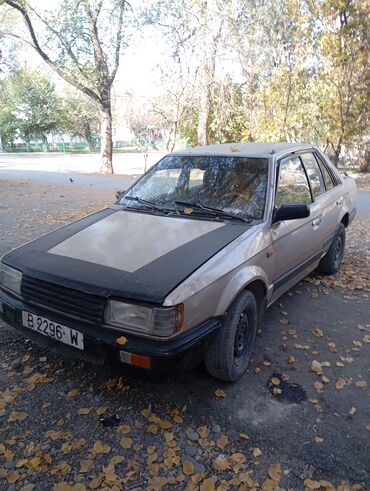 коробка на торнео: Mazda 323: 1985 г., 1.5 л, Механика, Бензин, Седан