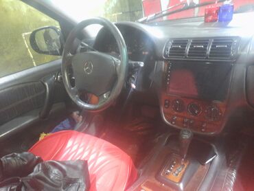 Mercedes-Benz: Qara rəngli Mercedes-Benz ML seriyalı avtomobil. Salonu qırmızı lalafo.az -da Mercedes-Benz: Qara rəngli Mercedes-Benz ML seriyalı avtomobil. Salonu qırmızı